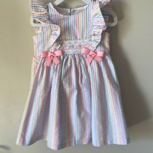 Bonnie Baby  Flutter Sleeved
Striped Seersucker Dress w Smocking Panel & Bows